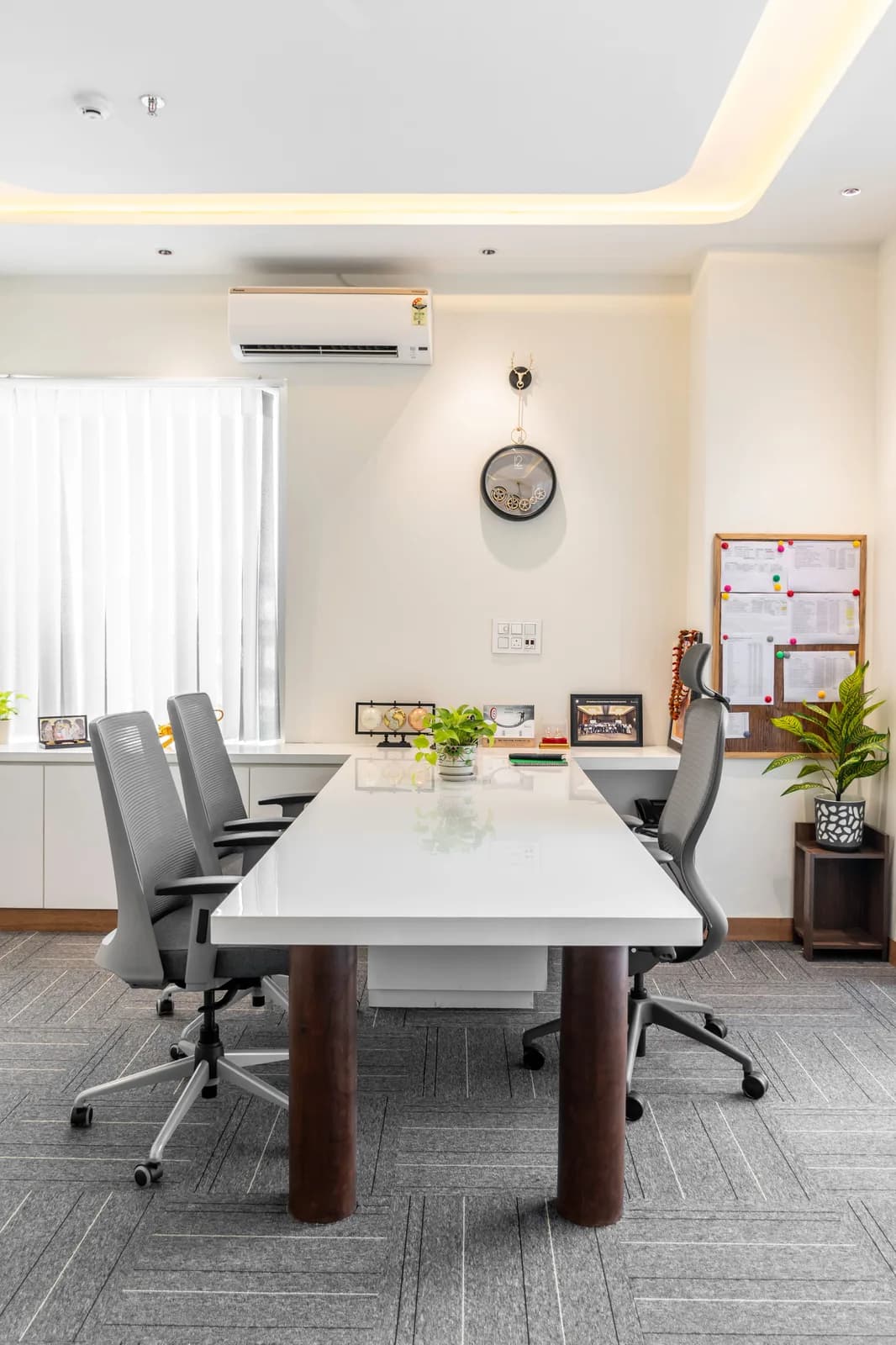 White Conference Table Dark Cylinder Base